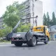 Sinotruk 7CBM мусоровоз с поворотным рычагом и бункерным погрузчиком