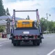 Sinotruk 7CBM мусоровоз с поворотным рычагом и бункерным погрузчиком